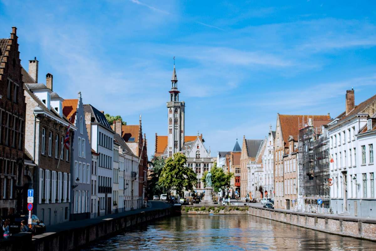 View of the river and gothic architecture in Bruges Belgium