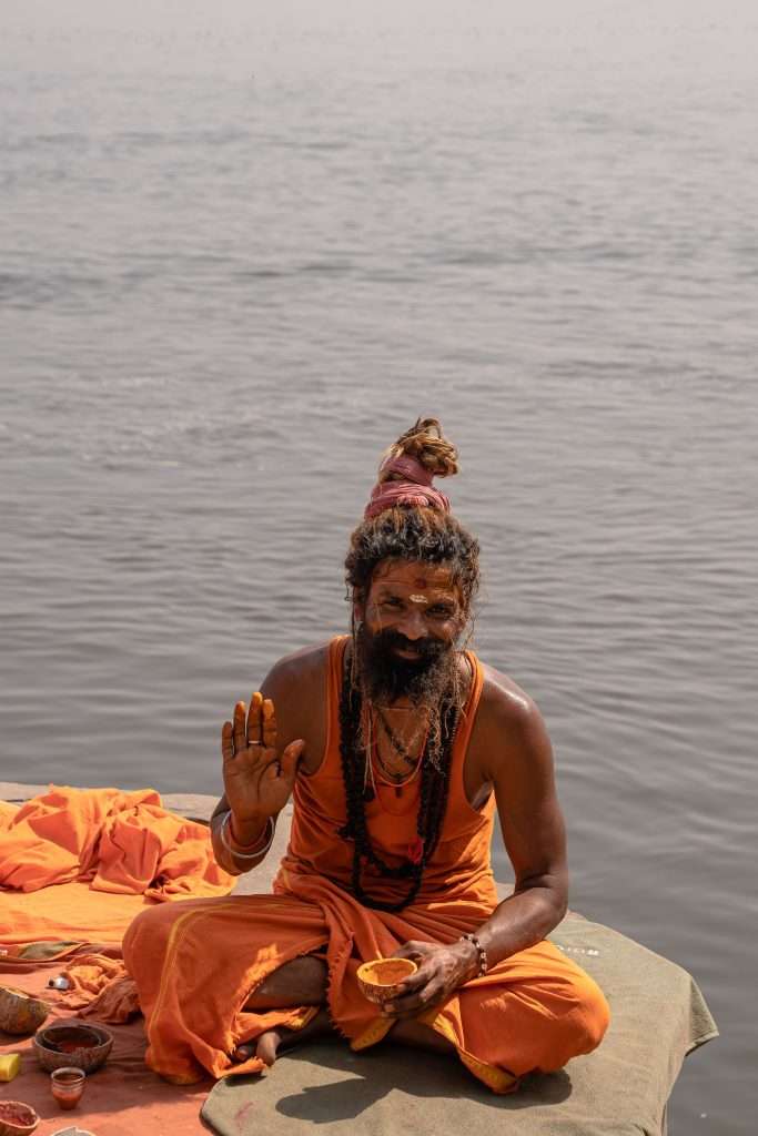 Holy man on the river Ganges in Varanasi 