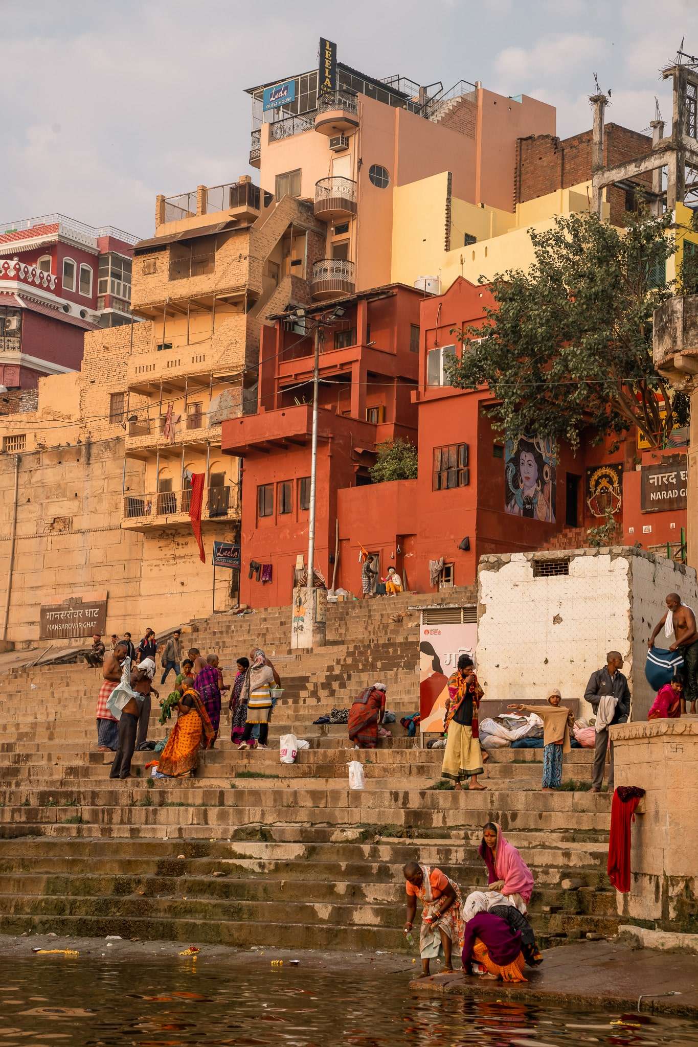 People washing themselves in the river Ganges in Varanasi - Is Varanasi Safe for Solo Female Travellers