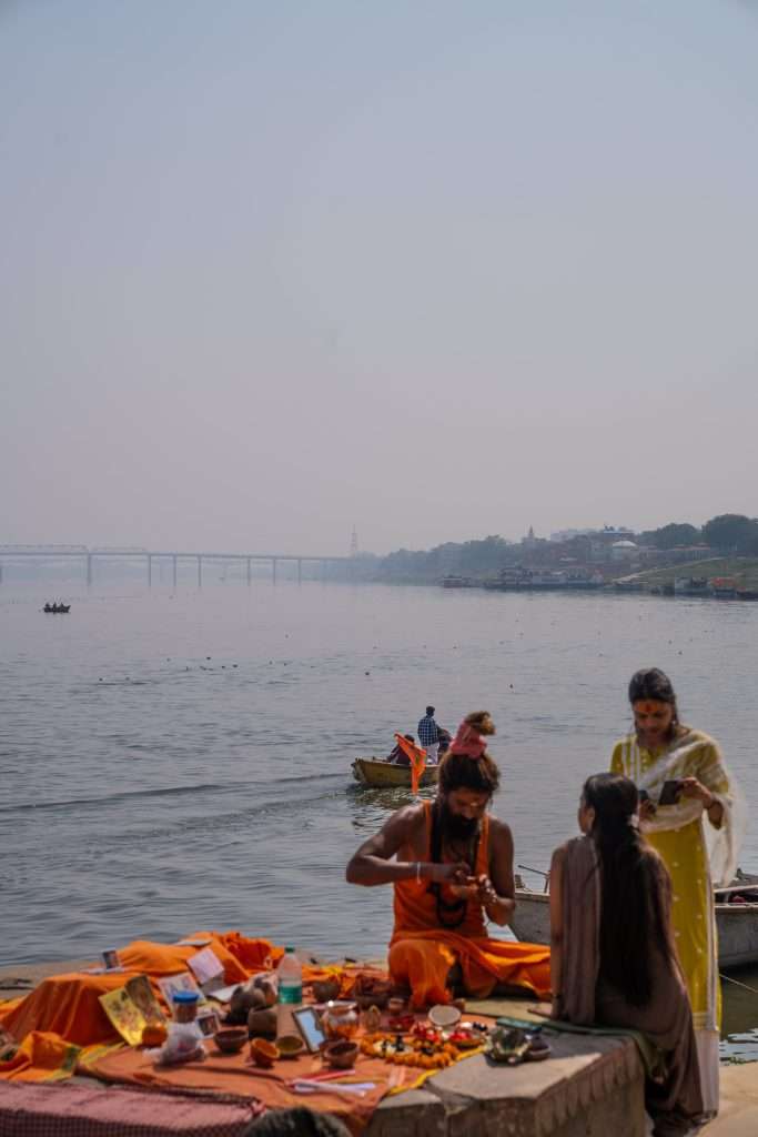 Blessings taking places on the river Ganges in Varanasi, India