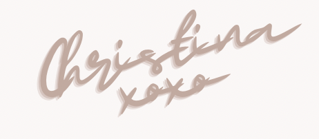 Stylized handwritten text in a script font reads "Christina xoxo" in a soft brown color on a light background.